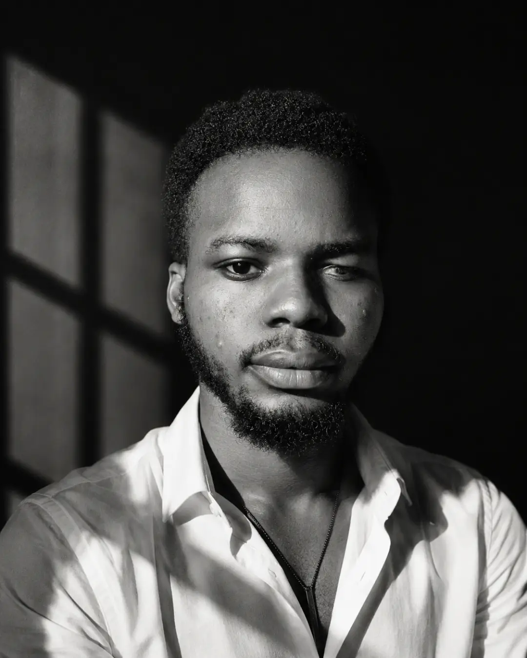 Portrait of Omonowo Israel, Community Director — AiCE.
